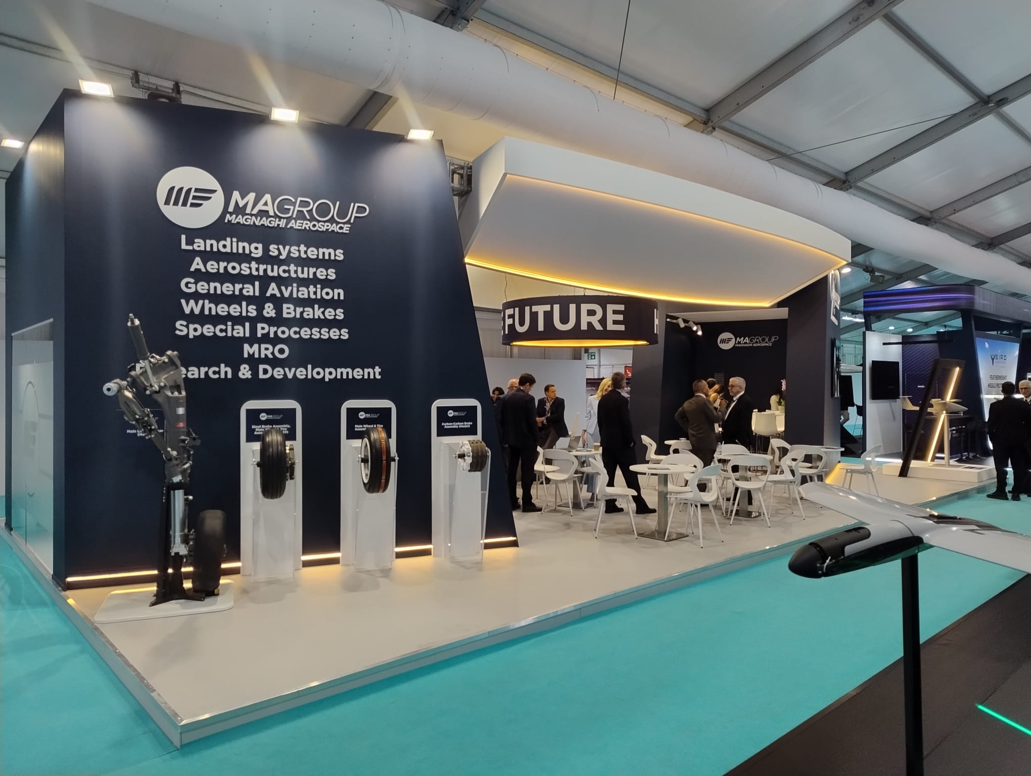 Allestimento stand MAGROUP Magnaghi Aerospace alla fiera aeronautica FIA Farnborough